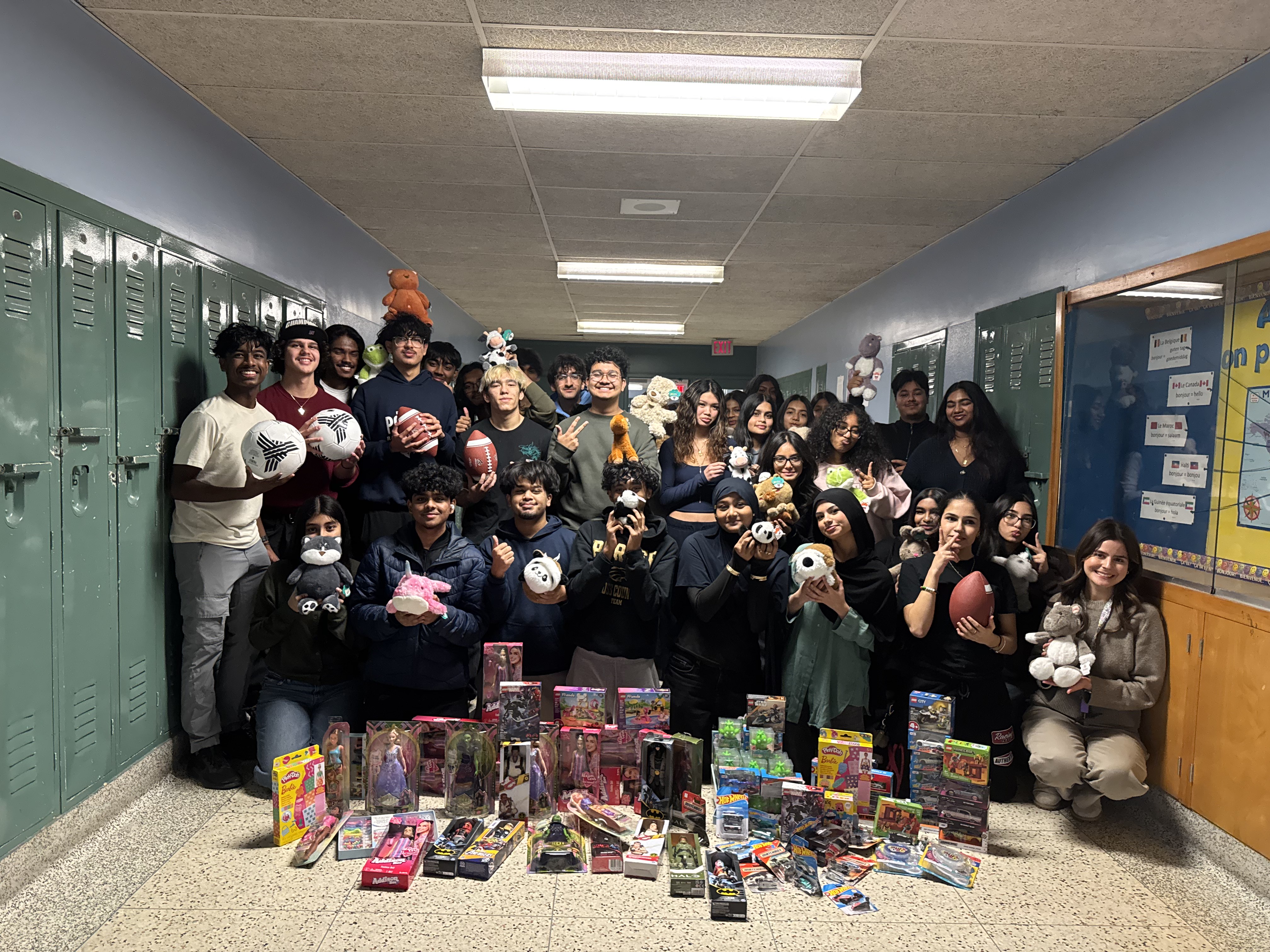 Equity Toy Drive group with toys